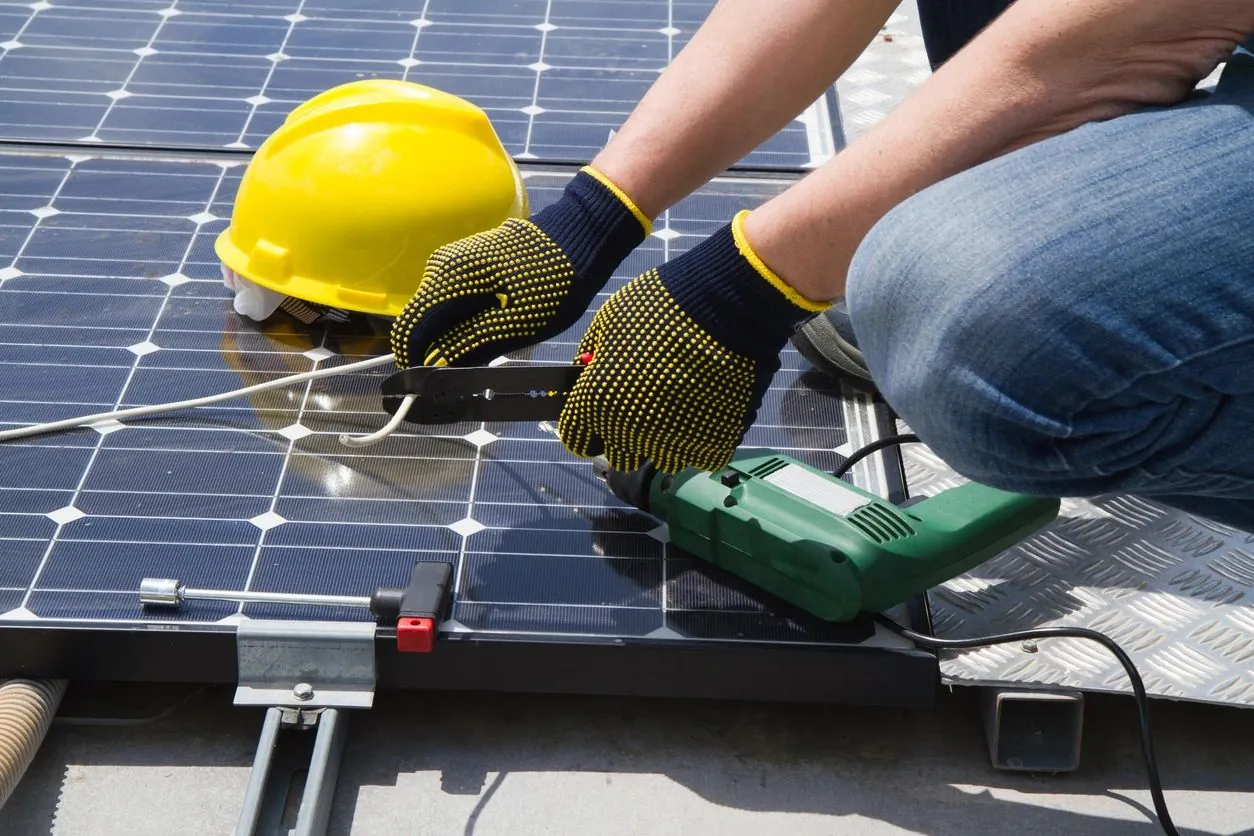 The Solar Doctors team installing solar panels on a residential roof